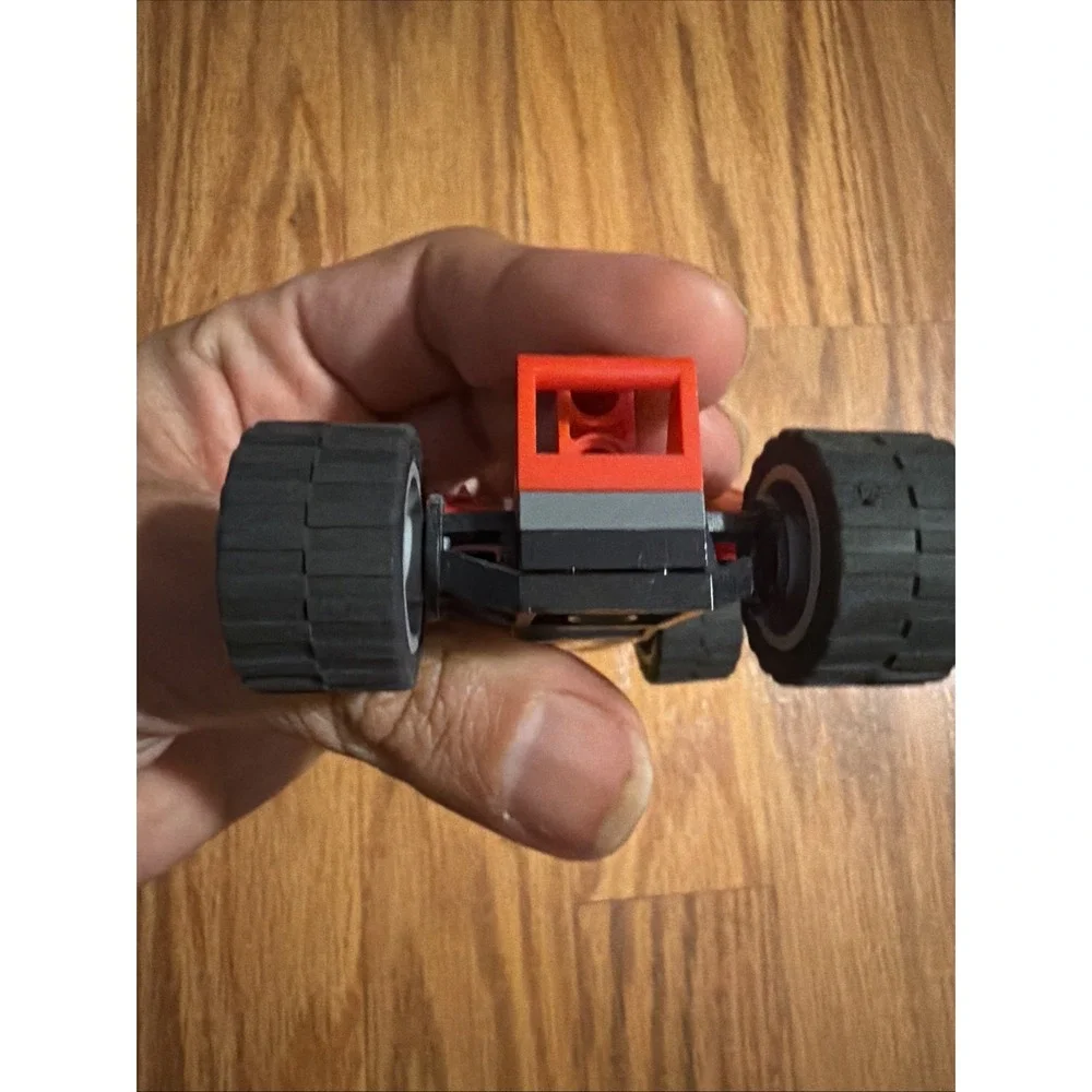 Red Lego Ferrari Bridgestone Shell Four-Wheel Car